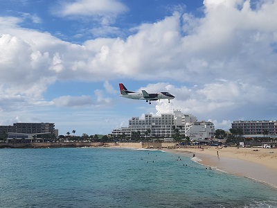 A small prop plane coming in to land. Not nearly as impressive as the airbus I caught on video, but still gives an idea of scales.