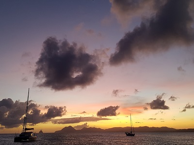 Sunset with the sliver of the new moon.